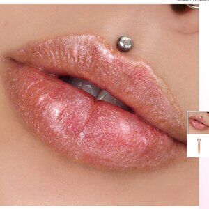 The Gloss - Shockwave, New Jeffree Star. Light bronze tint w/ pink & white